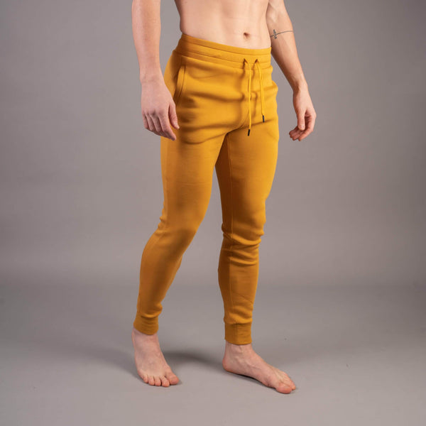 Joggebukse for herrer i orange med snøring i livet fra BARA Sportswear